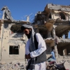 Residents walk through the rubble after what Taliban officials said were Pakistani airstrikes a day earlier that killed civilians, including children, in the village of Mandokhail, Chamkani district, Paktia province, Afghanistan, Monday, June 29, 2026.