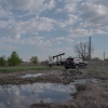 Scott Rabinowitz, president of Grand Resources, stands near a pump jack in Sperry, Okla., on March 20, 2024.