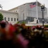 A person rests in front of the U.S. Supreme Court on June 5 in Washington, D.C.