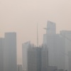 Haze from Canadian wildfires blankets the Manhattan skyline as seen from the Top of the Rock Observation Deck on July 16, 2026 in New York City.