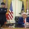 President Donald Trump, right, speaks during a news conference with Elon Musk in the Oval Office of the White House, Friday, May 30, 2025, in Washington.