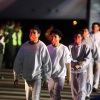 Venezuelan migrants deported from US Naval Station Guantanamo Bay walk down from the Venezuelan Conviasa Airlines plane as they arrive at Simon Bolivar International Airport in Maiquetia, Venezuela on February 20, 2025.