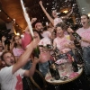 People spray sparkling wine as they celebrate early exit poll results for Israel's general election in Tel Aviv, Israel, Tuesday,.