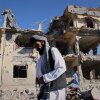 Residents walk through the rubble after what Taliban officials said were Pakistani airstrikes a day earlier that killed civilians, including children, in the village of Mandokhail, Chamkani district, Paktia province, Afghanistan, Monday, June 29, 2026.