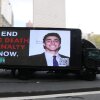 A truck with a video screen outside Manhattan federal court on April 25 to attend court as Luigi Mangione is set to be arraigned.