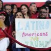 Supporters hold a sign before Republican presidential nominee former President Donald Trump arrives to speak during a campaign event, Sept.12, in Tucson, Ariz.