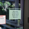 A sign reads, ' This Facility is Closed Due to the Federal Government Shutdown', on the door to the Everglades National Park visitors center on October 01, 2025, in Everglades National Park, Florida. The park will remain open to visitors, but with minimal staffing.