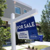 A for sale in front of a home in Miami.