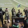 Israeli female soldier hostages wave at a Palestinian crowd before being handed over to the Red Cross in Gaza City, Saturday, Jan. 25, 2025.