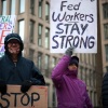 Protesters rally outside of the Theodore Roosevelt Federal Building headquarters of the U.S. Office of Personnel Management on Feb. 5 in Washington, DC.