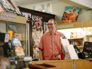 David Logan, who manages a bookstore called Bookends, says he has seen new business since a trendy bakery opened across the street.