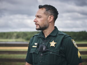 Sgt. Oscar D'Lassalas can enforce certain parts of federal immigration law. He didn't seek out the training — he was chosen, he says.