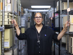 Laurice Bell runs the Shorefront Legacy Center, a community archive that collects papers and items documenting Evanston's Black history. Residents applying for reparations came to the archive for help finding proof that their families had lived in the city during the height of segregation.