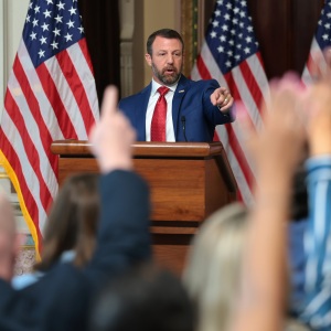 Secretary of Homeland Security Markwayne Mullin answers questions from reporters on July 17 after remarks about his agency alleging that more than 250,000 non-U.S. citizens are on the voter rolls in just four states. Those states dispute that tally.