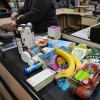 A cashier scans groceries, including produce, which is covered by the USDA Supplemental Nutrition Assistance Program (SNAP), at a grocery store in Baltimore on Monday.