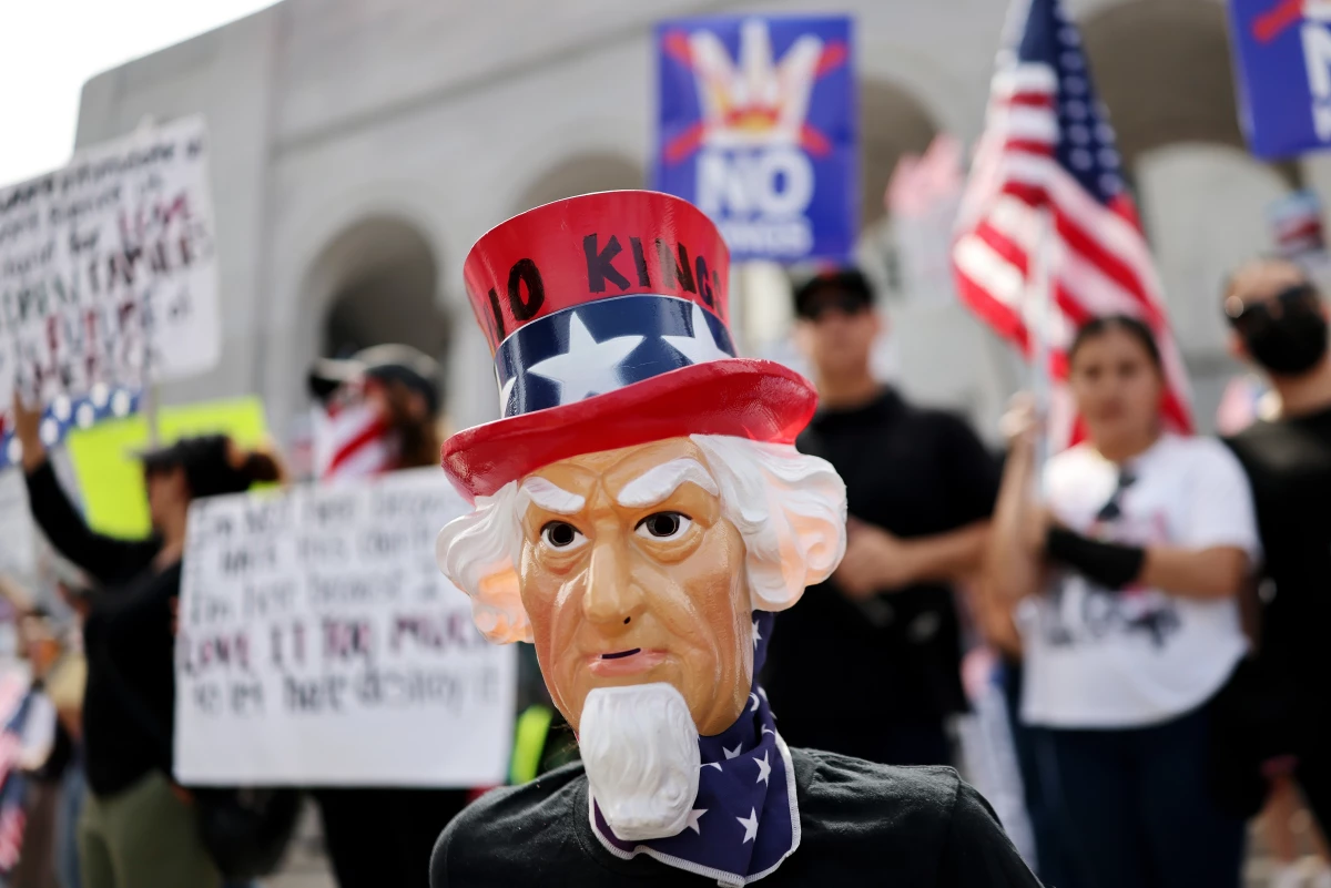 Protesters rally in front of City Hall in Los Angeles on Saturday.