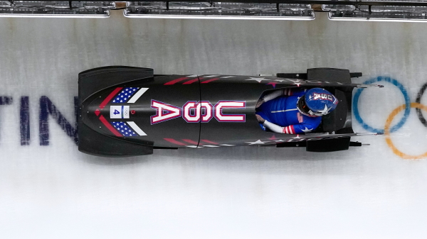 United States' Kaillie Humphries slides down the track during a women's monobob run at the 2026 Winter Olympics, in Cortina d'Ampezzo, Italy, Monday, Feb. 16, 2026.