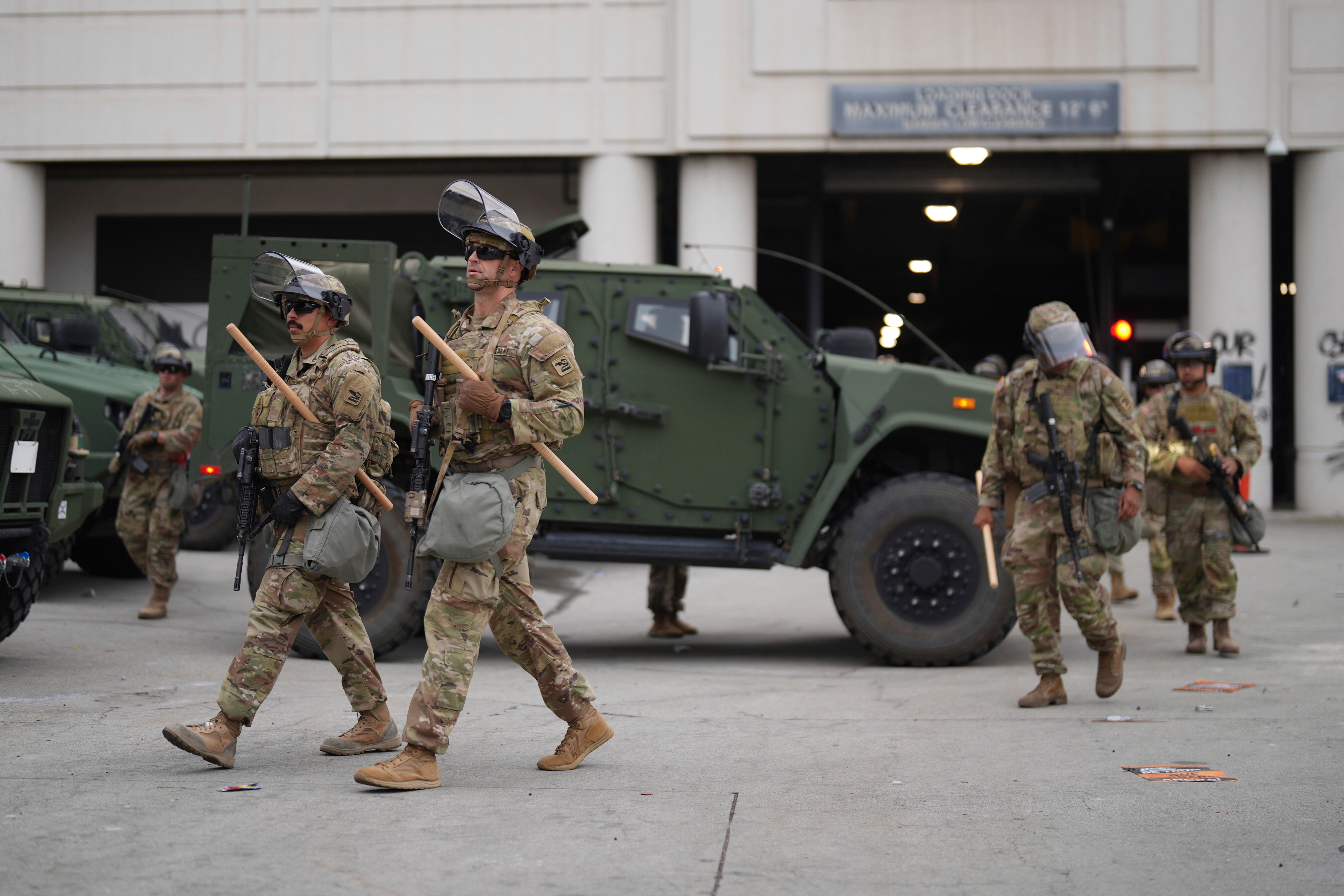 U.S. National Guard are deployed around downtown Los Angeles, Sunday, June 8, following an immigration raid protest the night before.