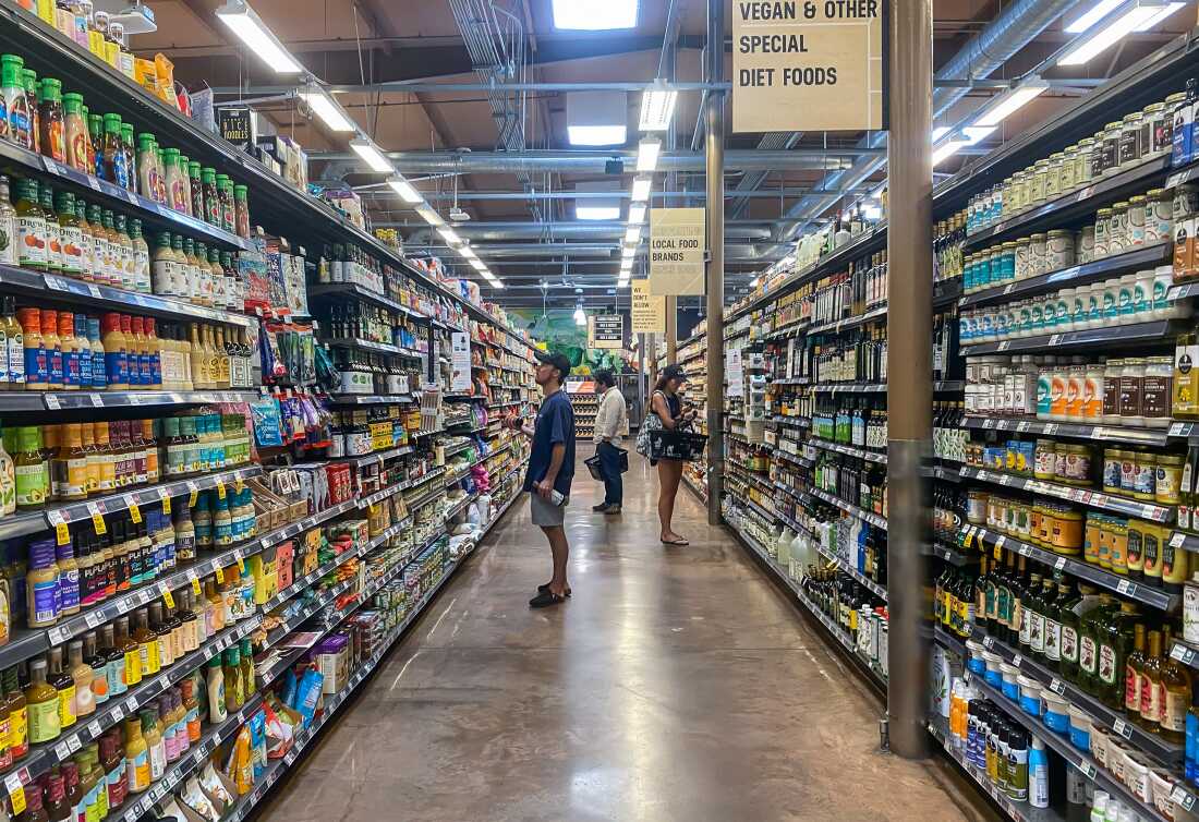 People shop at a supermarket in Santa Monica, California, on September 13, 2022.