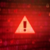 Rogue ACA insurance agents could face charges under Wyden bill : Shots 10 An ominous red background with and a caution symbol suggest danger online.