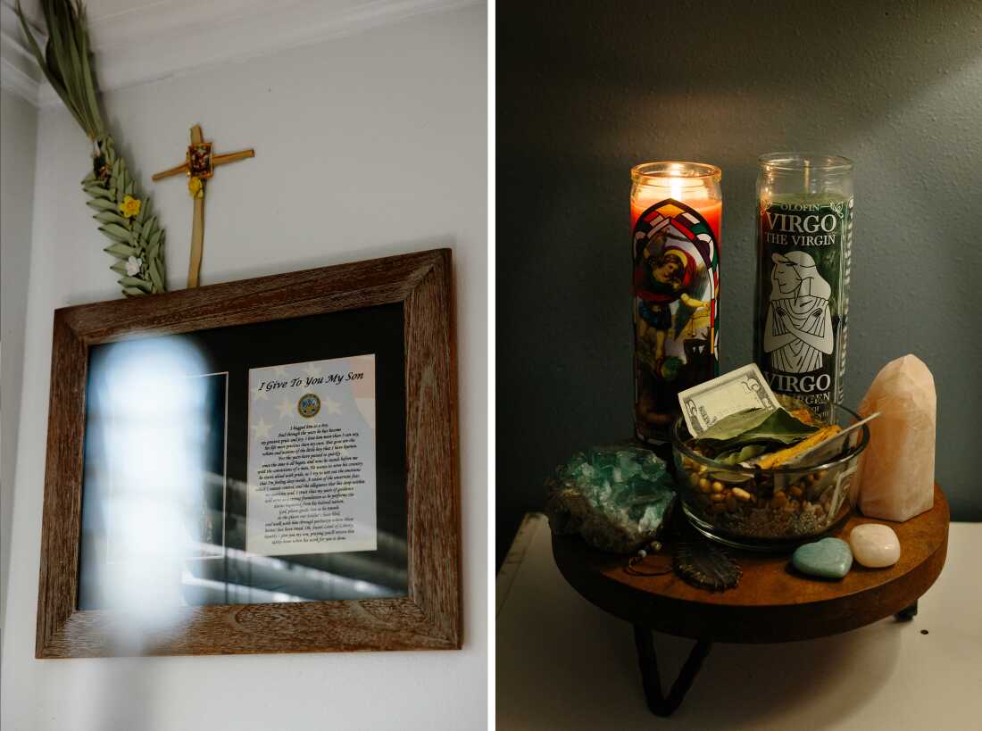  A shrine with a candle Serrato lit for her partner while he is deployed.