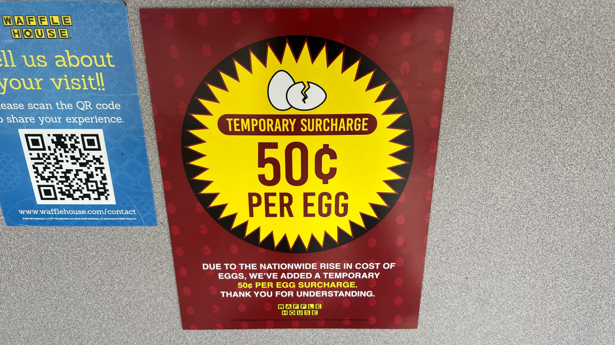 A notice in a Waffle House restaurant in Houston on Feb. 6 notifies customers of a 50-cent price hike per egg 'due to the nationwide rise in cost of eggs.'
