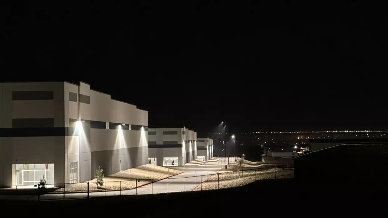 A massive 826,780-square-foot warehouse sits illuminated Feb. 12, 2026, in the El Paso suburb of Socorro, Texas, that was recently purchased by the U.S. Department of Homeland Security for $122.8 million.