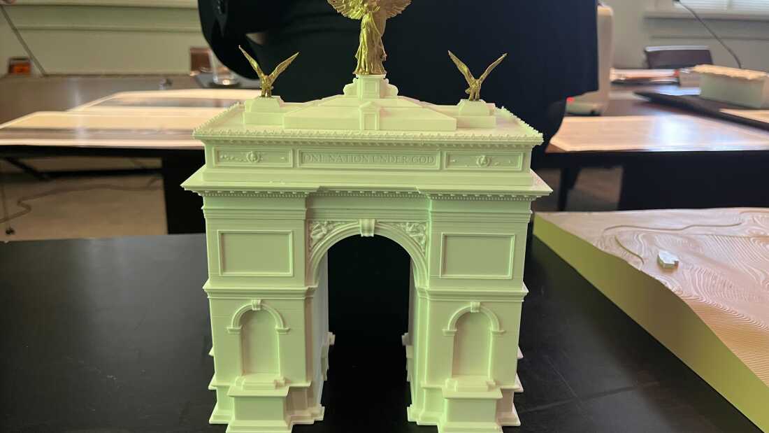 An architect's rendering of the proposed arch, with the Memorial Bridge and Lincoln Memorial at right, is on display for the Fine Arts Commission hearing