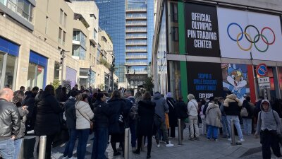 On a sunny Sunday morning smack-dab in the middle of the Winter Olympics, the line to enter Milan's Official Olympic Pin Trading center was out the door and steadily growing.