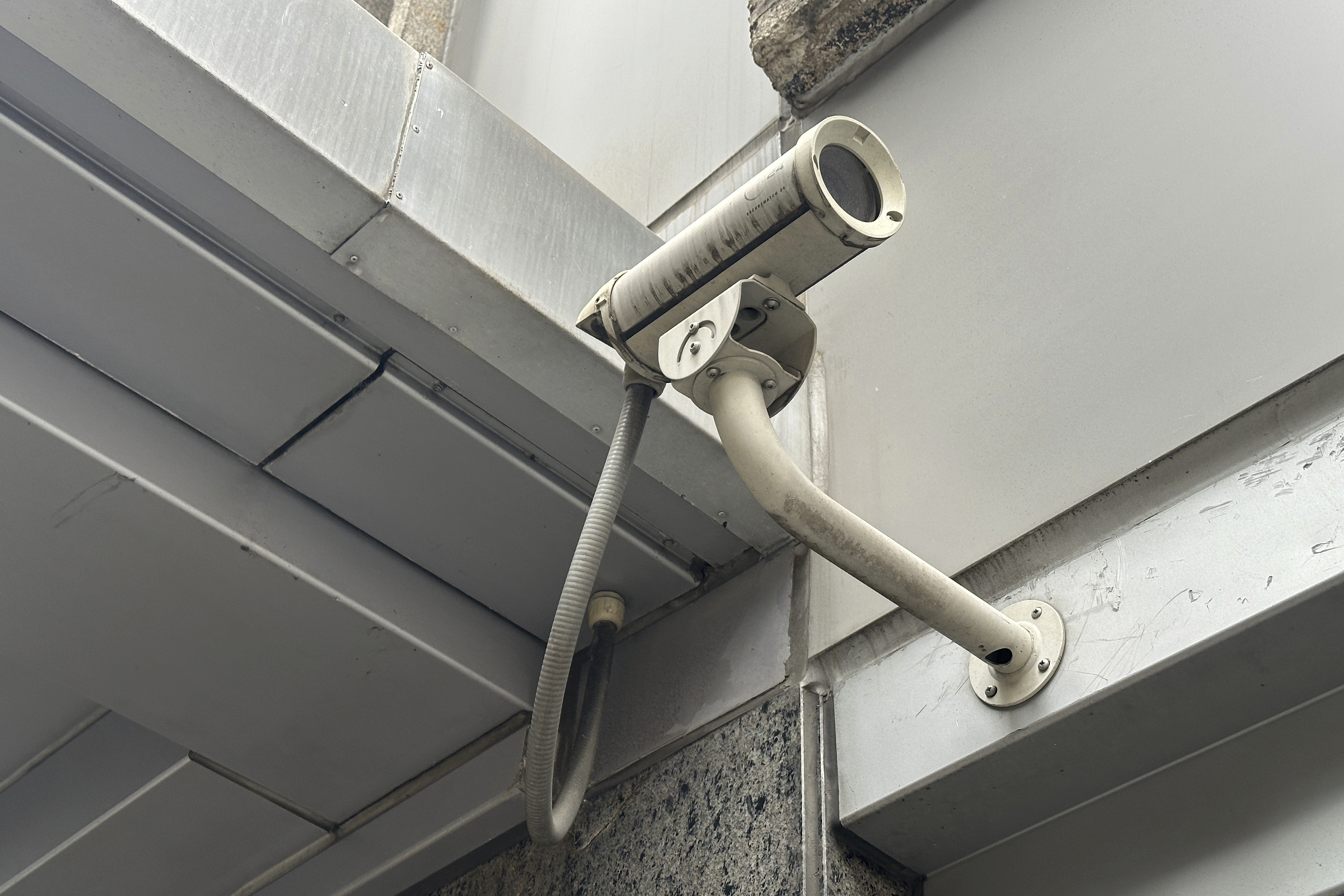 A surveillance camera is seen at the 54th Street entrance to the New York Hilton Midtown Hotel in New York on Thursday, where Brian Thompson, the CEO of UnitedHealthcare, was fatally shot on Wednesday. (AP)