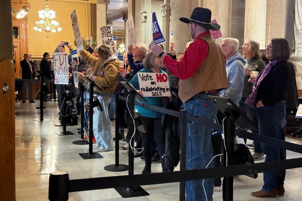 Indiana is currently represented in Congress by seven Republicans and two Democrats. The new map could wipe out those two Democratic seats. Above, protesters at the state capitol on Monday.