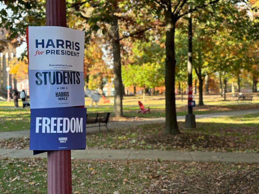 Students for Harris Walz signs hang at Indiana University of Pennsylvania ahead of a Get Out The Vote rally on Oct. 23, organized by the school's young Democrats. (NPR)