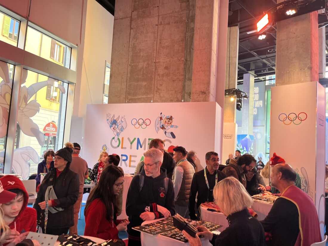 Inside, visitors can approach each other — and designated collectors at tables — to admire pins and negotiate potential swaps.