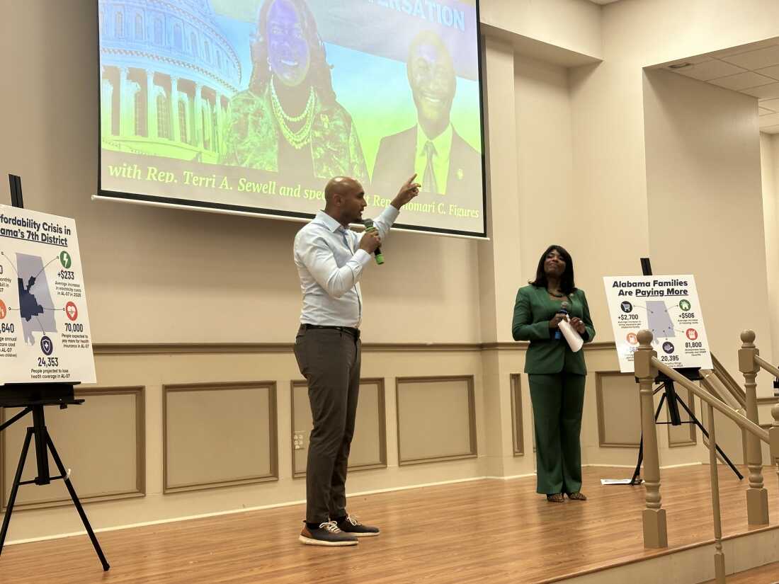 Democratic Reps. Shomari Figures, left, and Terri Sewell host a community event for voters at the Beulah Primitive Baptist Church in Lowndes County, Ala., on