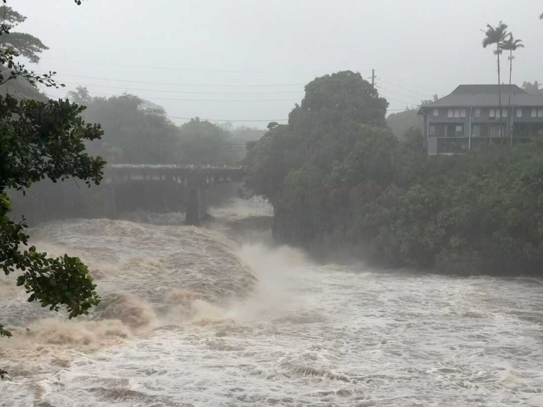 A view of the rising water levels at the Wainaku Street Bridge in Hilo on the Big Island of Hawaii, Saturday, Aug. 15, 2026.