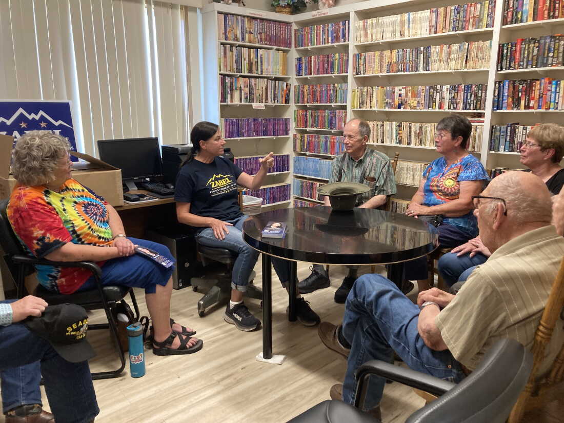 In this undated photo from the campaign, independent congressional candidate Sarah Zabel campaigns with community members in Grangeville, Idaho.