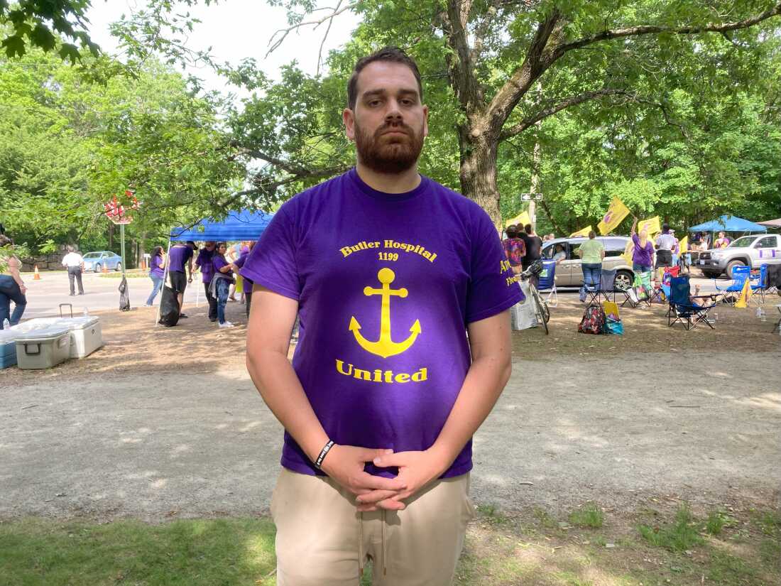 Andrew Kimball-Mirzaie, a mental health worker at Butler Hospital in Providence, Rhode Island, says he was assaulted by a patient. He participated in a three-month strike that began this spring. Lynn Arditi