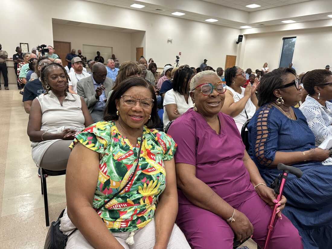 Willie Dixon, left, and Mary Gatson came to hear Alabama's two Black members of Congress speak at a local church on July 30. The ladies are concerned that confusion around congressional boundaries and primary dates may discourage Black voters.