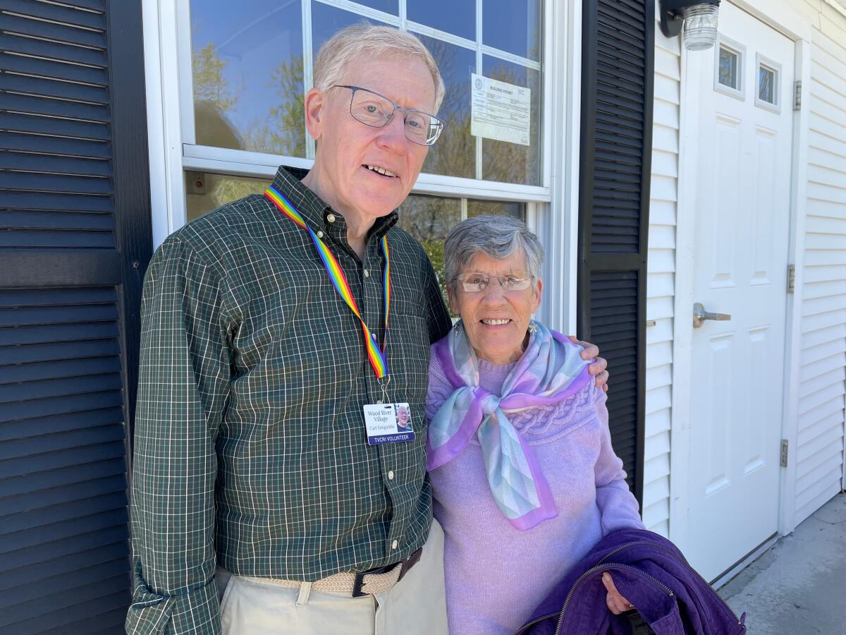 Carl Smigielski and his mother, Jacqueline, outside the Richmond Community Center in Richmond, R. I. Each is part of the other's support system.