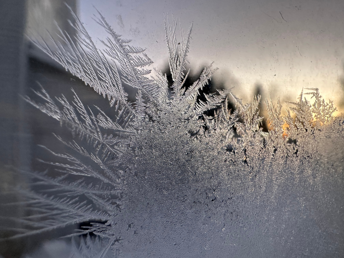 Ice crystals form inside a kitchen window in Lowville, New York.