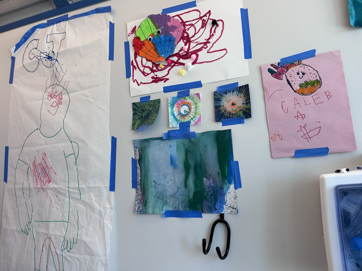 Art hangs on the wall in Caleb's room at Children's Hospital of Philadelphia.