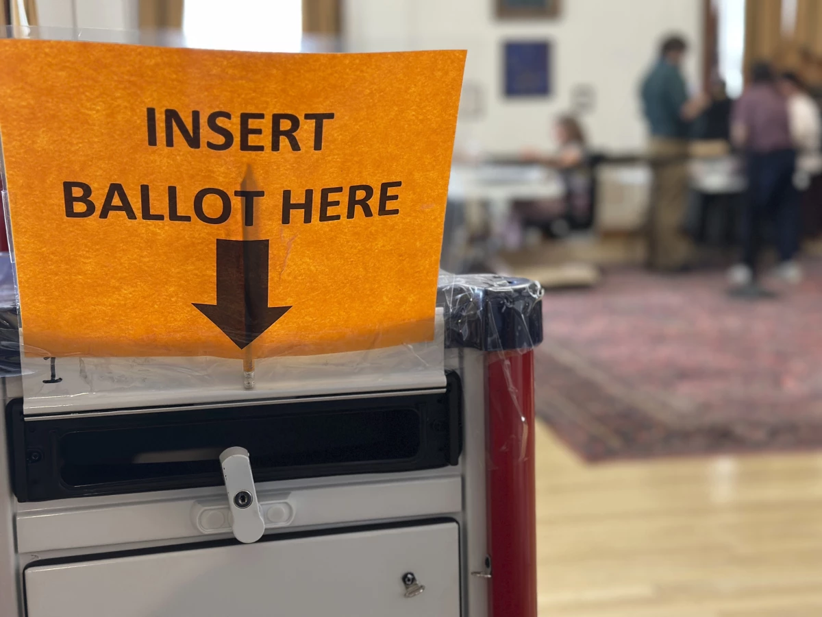 Election workers process absentee ballots on Nov. 4, 2024, in Portland, Maine. Maine is forgoing roughly $130,000 in election security grant money because the state does not plan to comply with new requirements from the Trump administration.