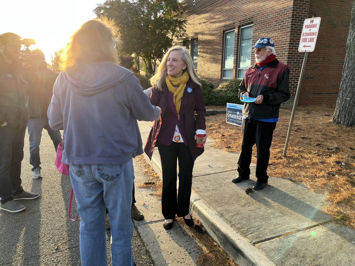 Rep. Abigail Spanberger greets voters on Election Day 2022 in Prince William County, Virginia.