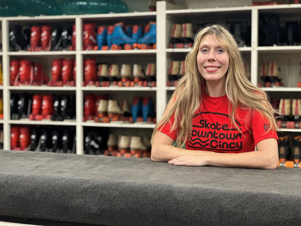 Morgan Rigaud leans on a countertop at the end of the night with a wall of colorful roller skates behind her. 'Everybody is challenged when they first put on skates,' she says. 'Everybody feels a little wobbly and uncertain of where they're going.'