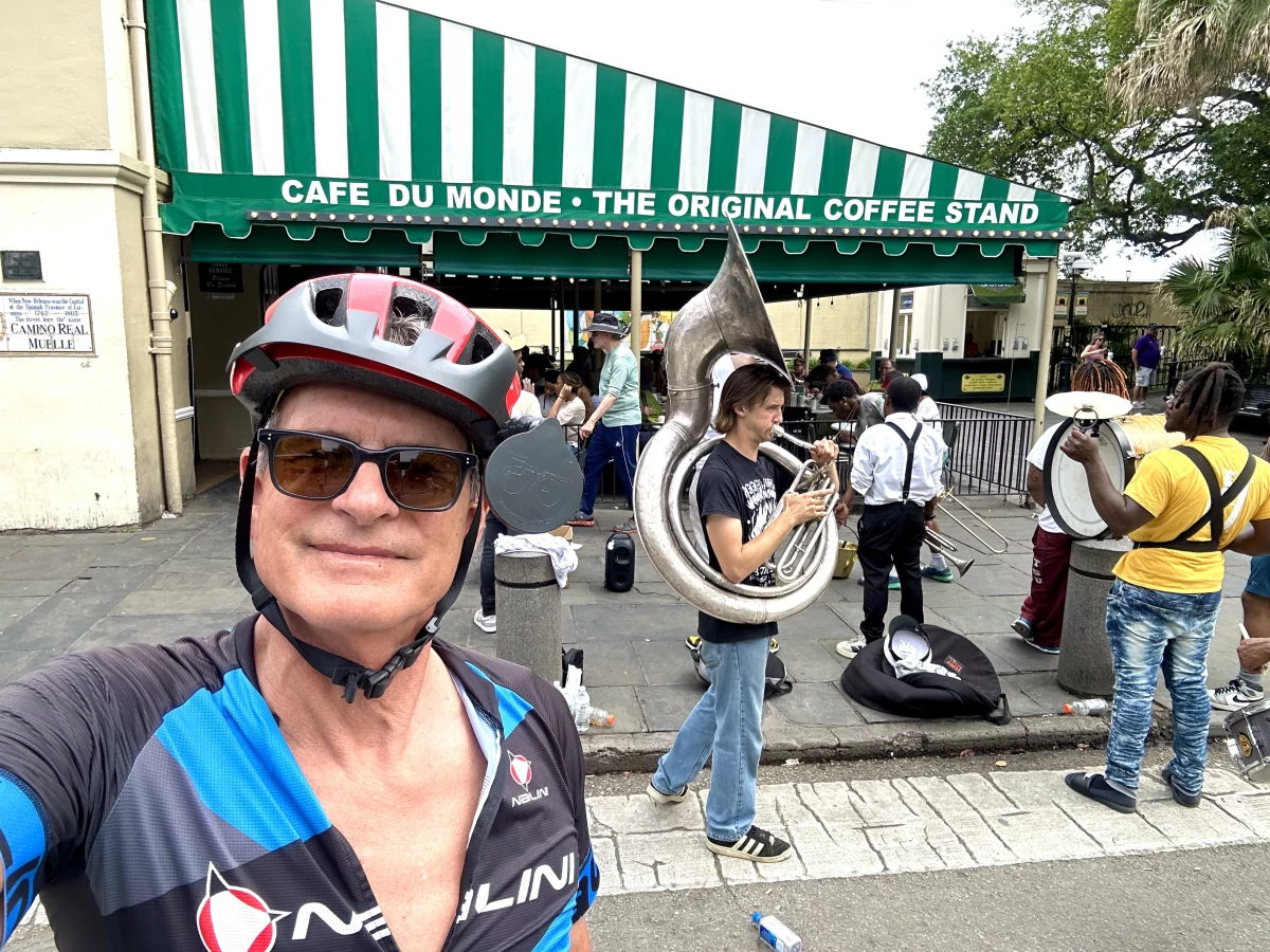 John Burnett takes an end-of-the-road selfie in front of Cafe du Monde, across the street from Jackson Square in New Orleans.
