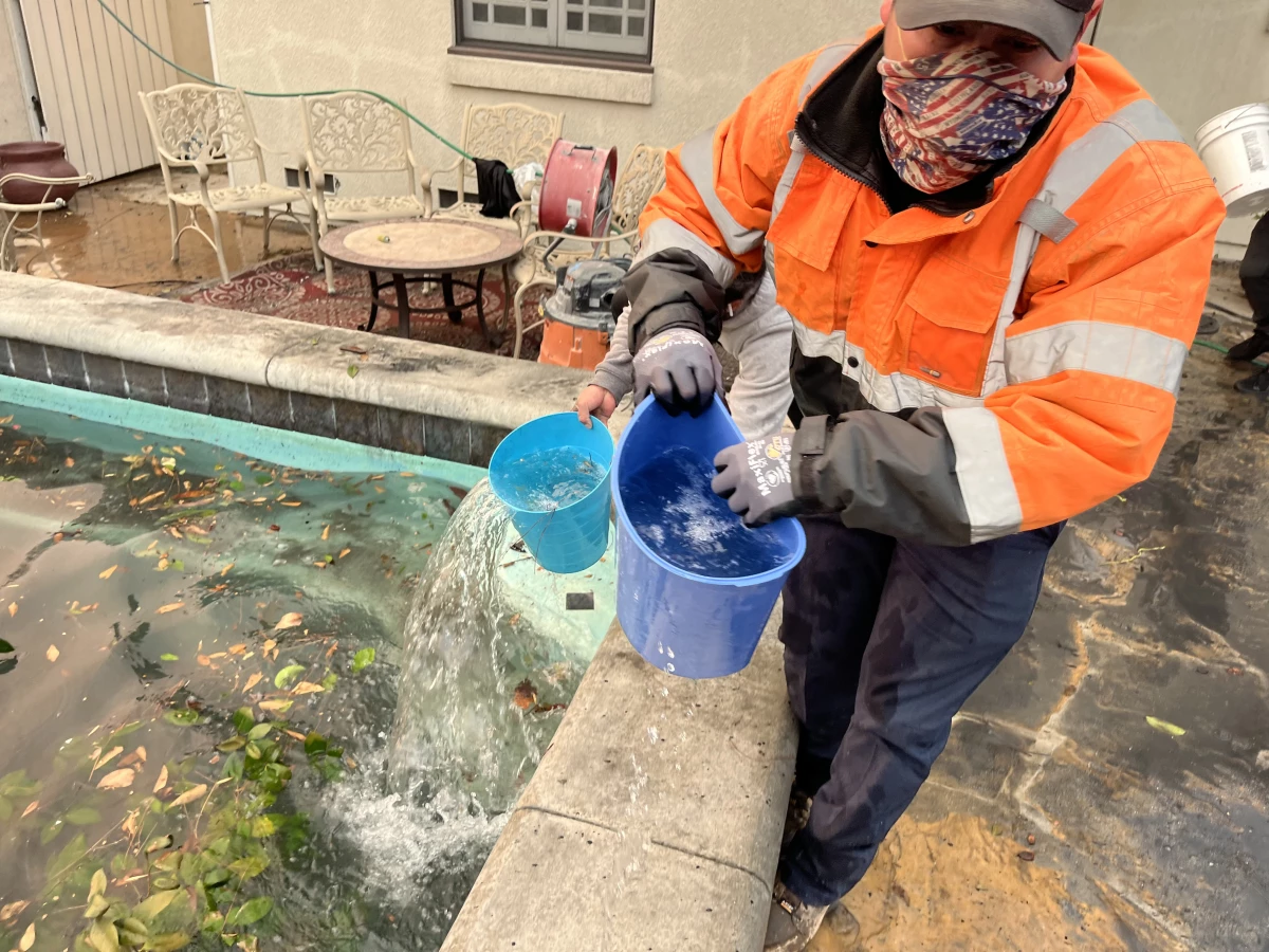 The volunteers drew water from a neighbor's swimming pool