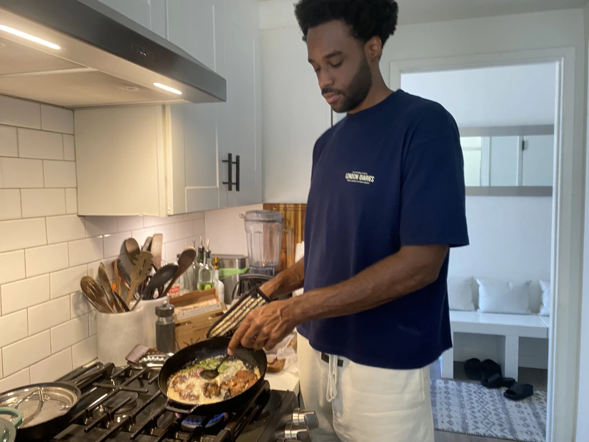 Malcolm Regisford prepares 'steaks' made out of mushrooms. When Regisford, a former Division 1 basketball player, cut out meat in college, his coaching staff and teammates were skeptical that he could get enough protein.