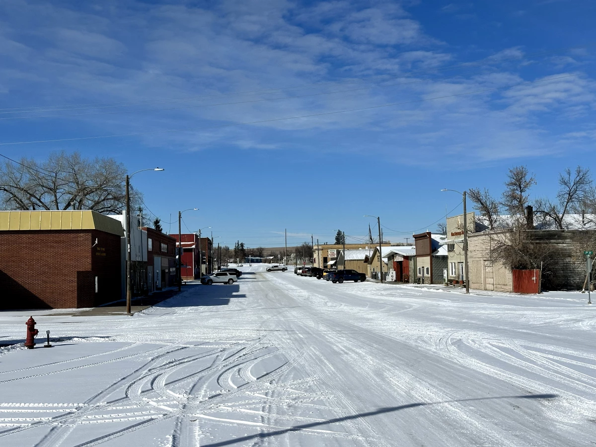 Big Sandy , in north-central Montana and home to nearly 800 people, is an isolated farming and ranching community about 80 miles from the nearest major town. 
