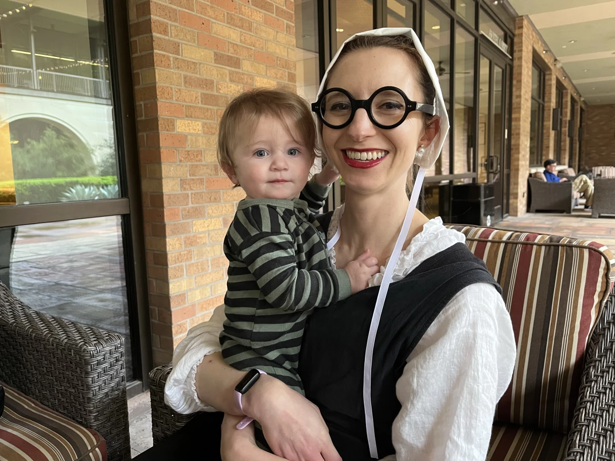 Simone Collins holds her 1-year-old daughter, Industry Americus Collins. Simone and her husband, Malcolm Collins, have become prominent faces in pronatalism.