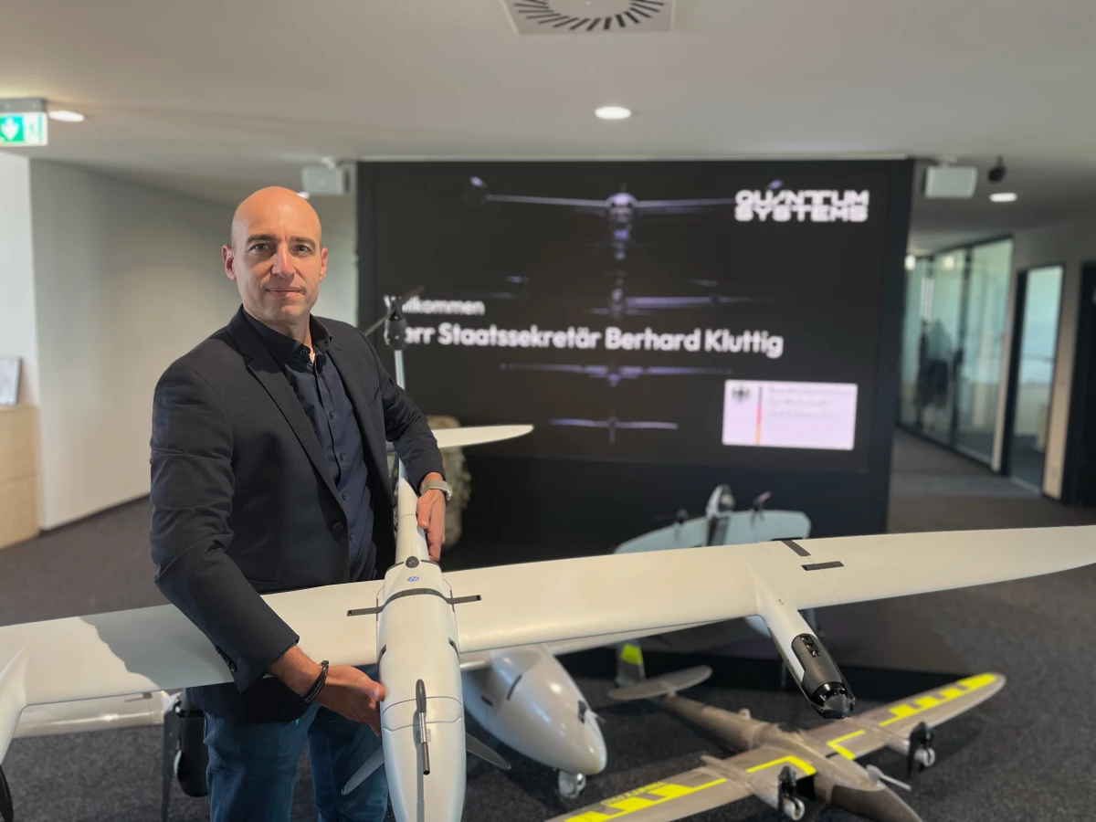 Quantum Systems' chief sales officer, Martin Karkour, holds one of his company's bestselling drones, the Vector, at the company's headquarters outside Munich. Quantum Systems' sales are up due to its role in providing Ukraine's military with drones to defend the country against a Russian invasion.